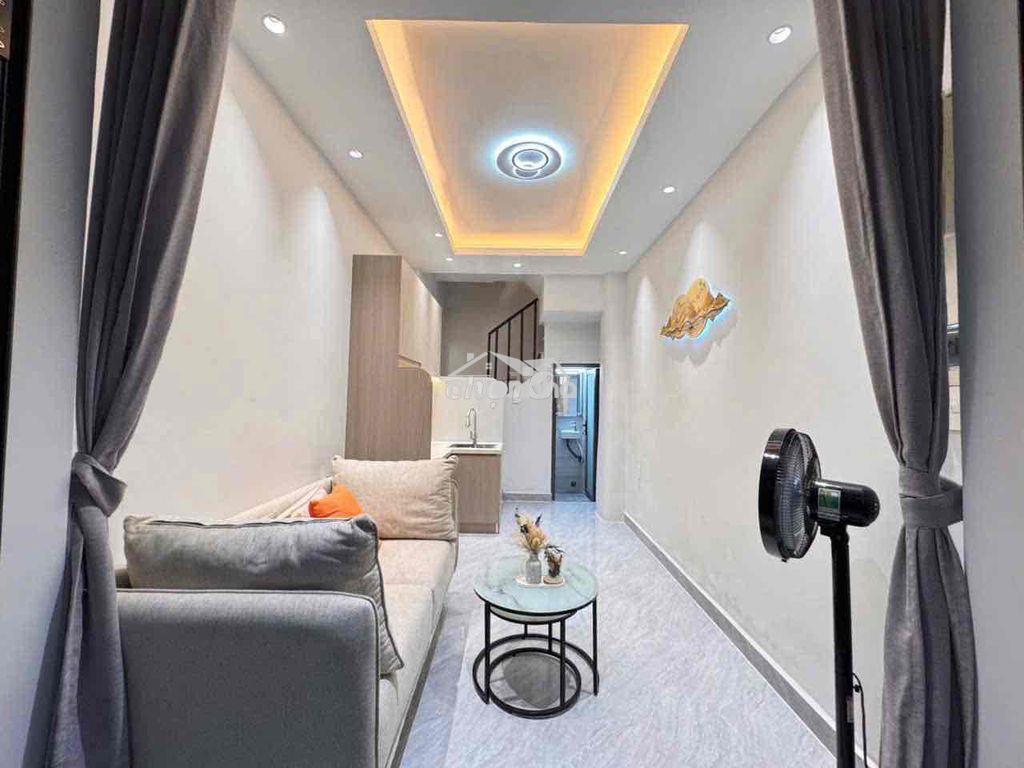 Nhà 3 tầng phú nhuận - cách mặt tiền 1 căn - 2