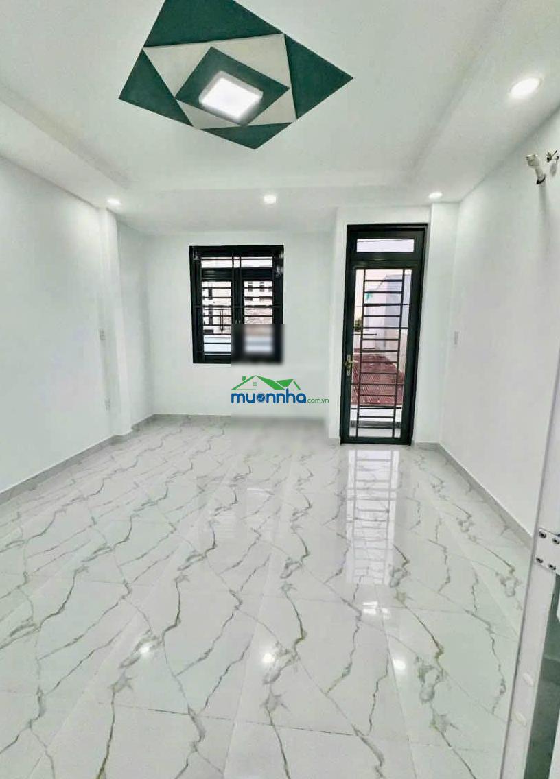 Chính chủ đứng bán nhà đẹp như hình dt 4 x 10m đúc lửng lầu 3pn 4 toilet hẻm thông 5m xe hơi