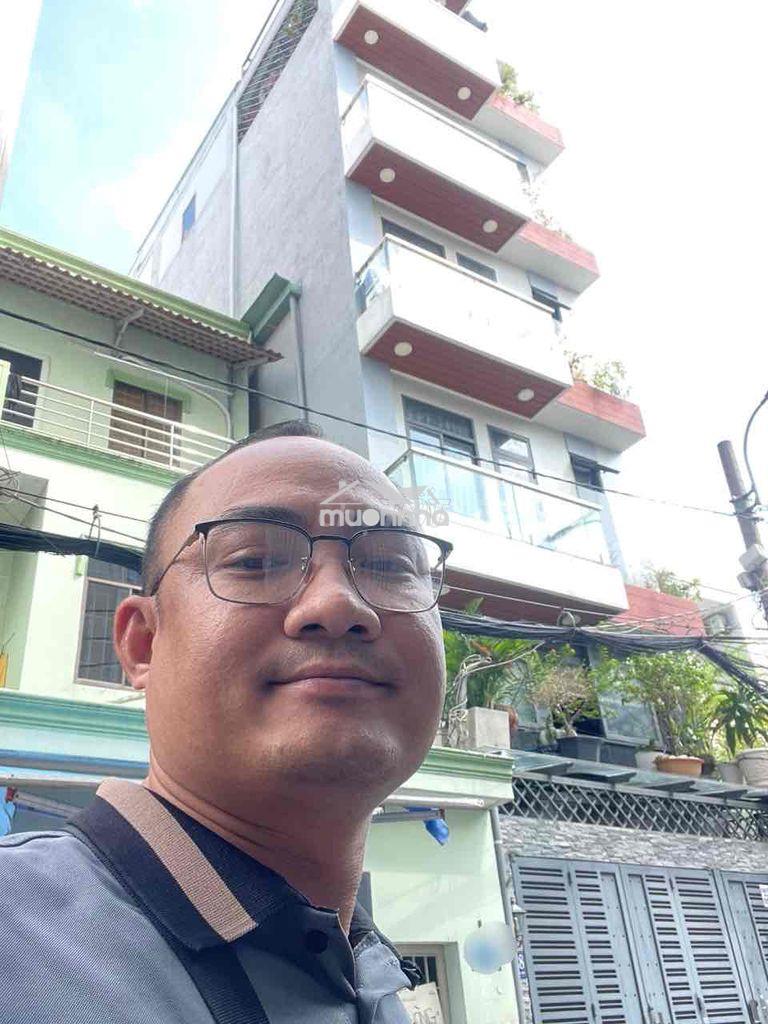 Toà nhà 7 tầng bên hông phú nhuận - hầm - thang máy đường 6.5m thông