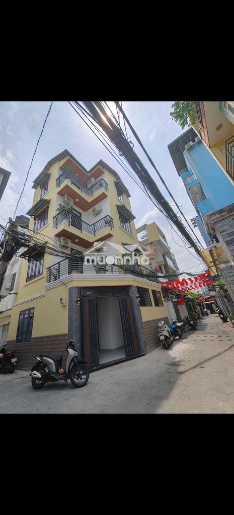 Nhà 4 tầng góc 2 mt hxh 585 nguyễn thị thập