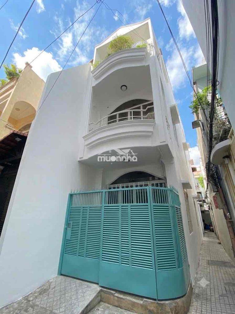 Nhà hẻm ba gác cách mt cmt8 10m( trệt 2 lầu đúc btct 4pn)