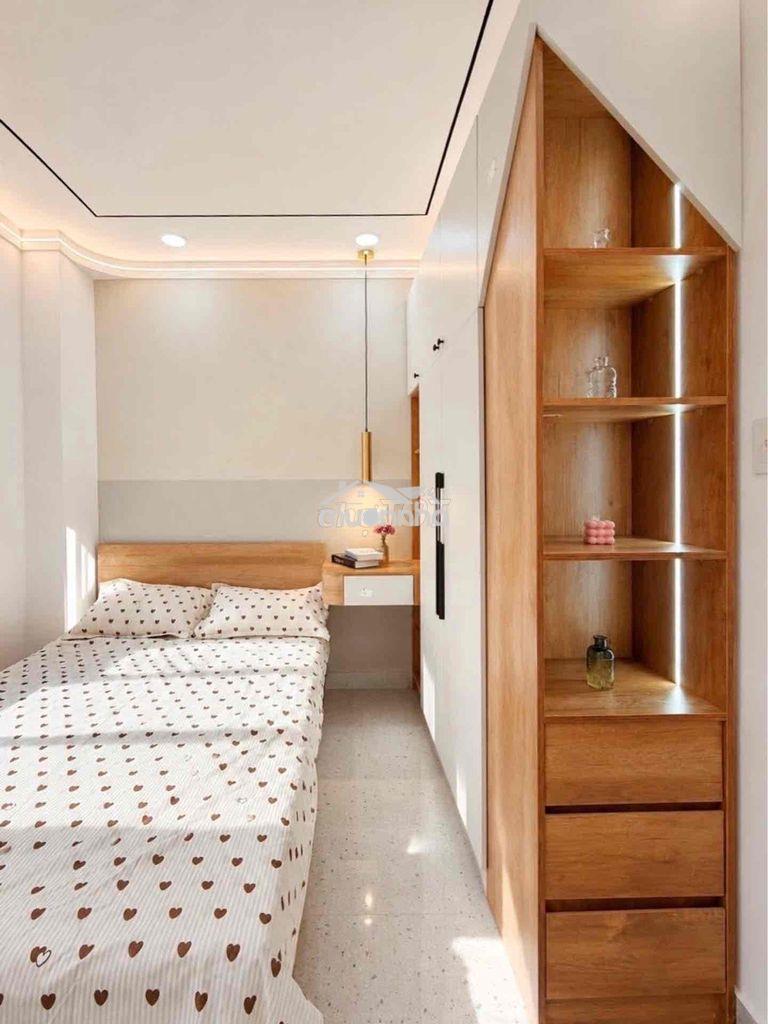 Phú nhuận - dt:40 m2-5 phút ra q.1 - hẻm thông - 2 tầng - 3pn (pn trệt - 4