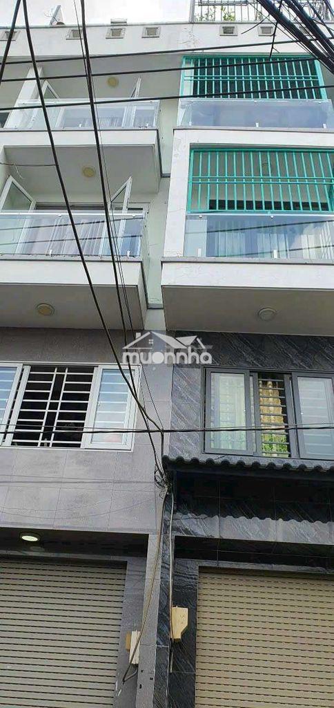 Nhà 1 trệt 1 lửng 2 lầu sân thượng 4pn hẻm xe hơi đường bùi văn ba