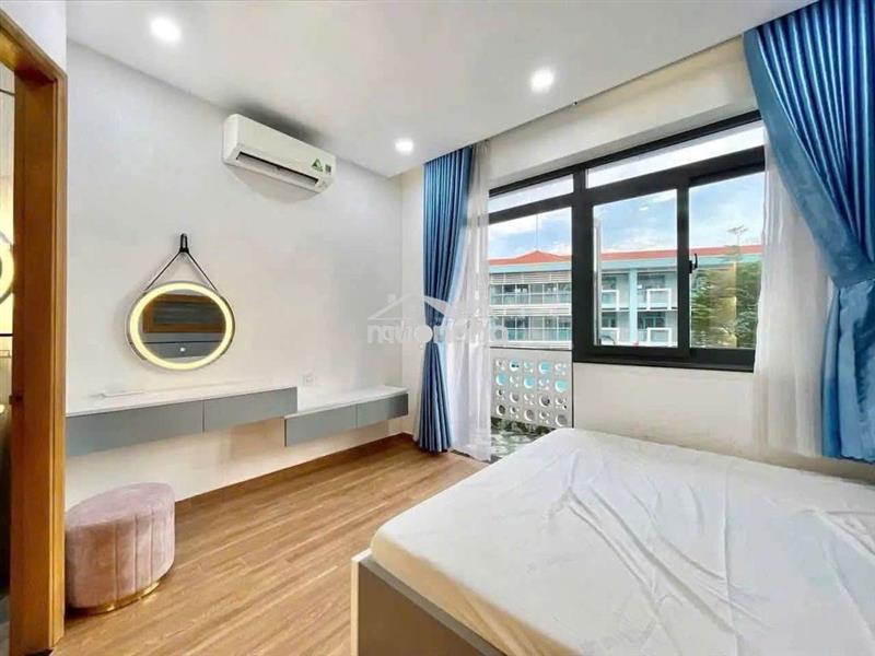 Cho thuê căn 1 phòng ngủ ban công tách bếp ngay công viên làng hoa